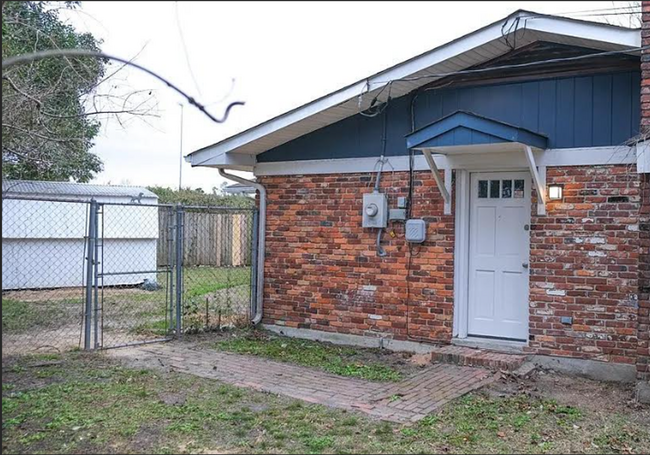 Building Photo - Charming 4BR/2BA Brick Home