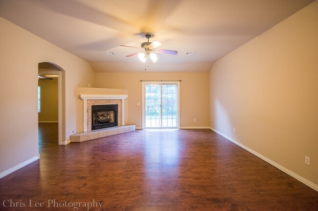 Building Photo - Three bedroom Home with Hardwood Floors Th...