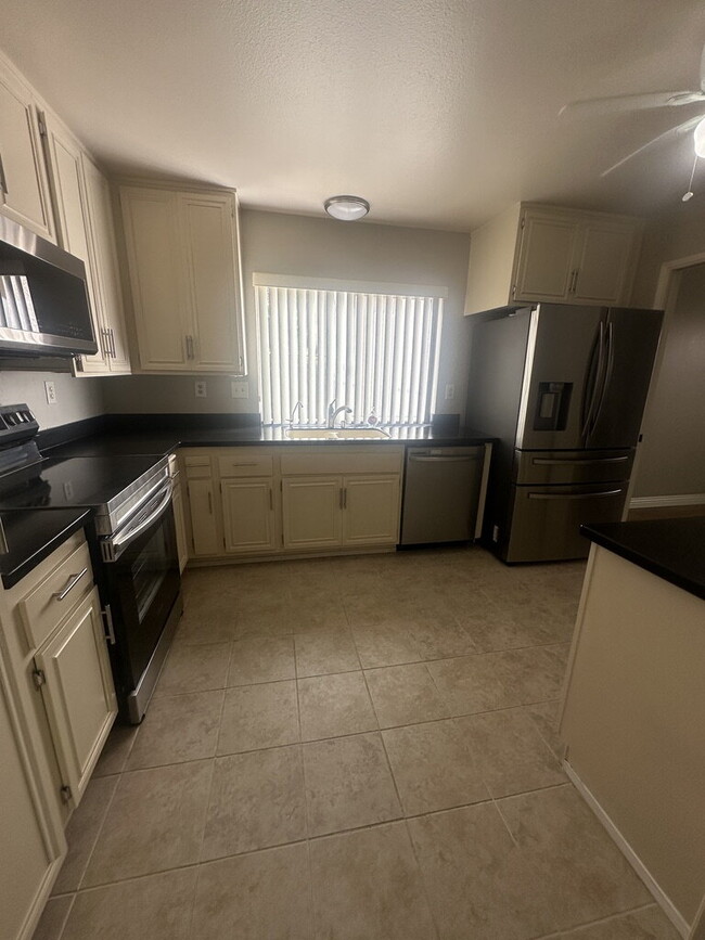 Building Photo - $3,400 - Charming Ground-Floor 2 Bed / 2 Bath Condo in Desirable Oaks North 55+ Community