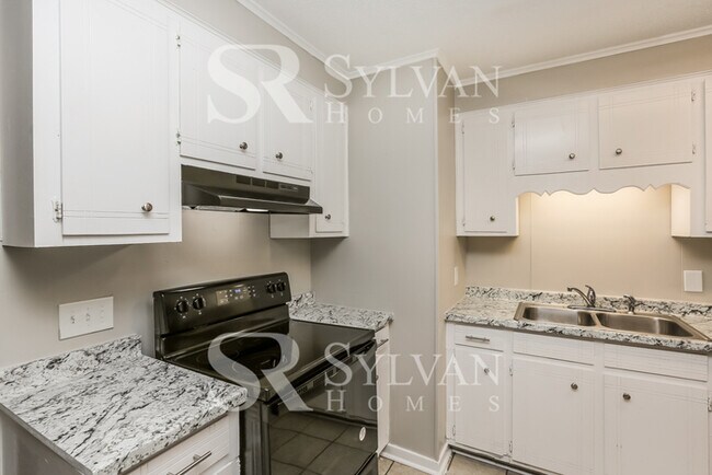 Building Photo - Lease today! No extra charge for contentme...