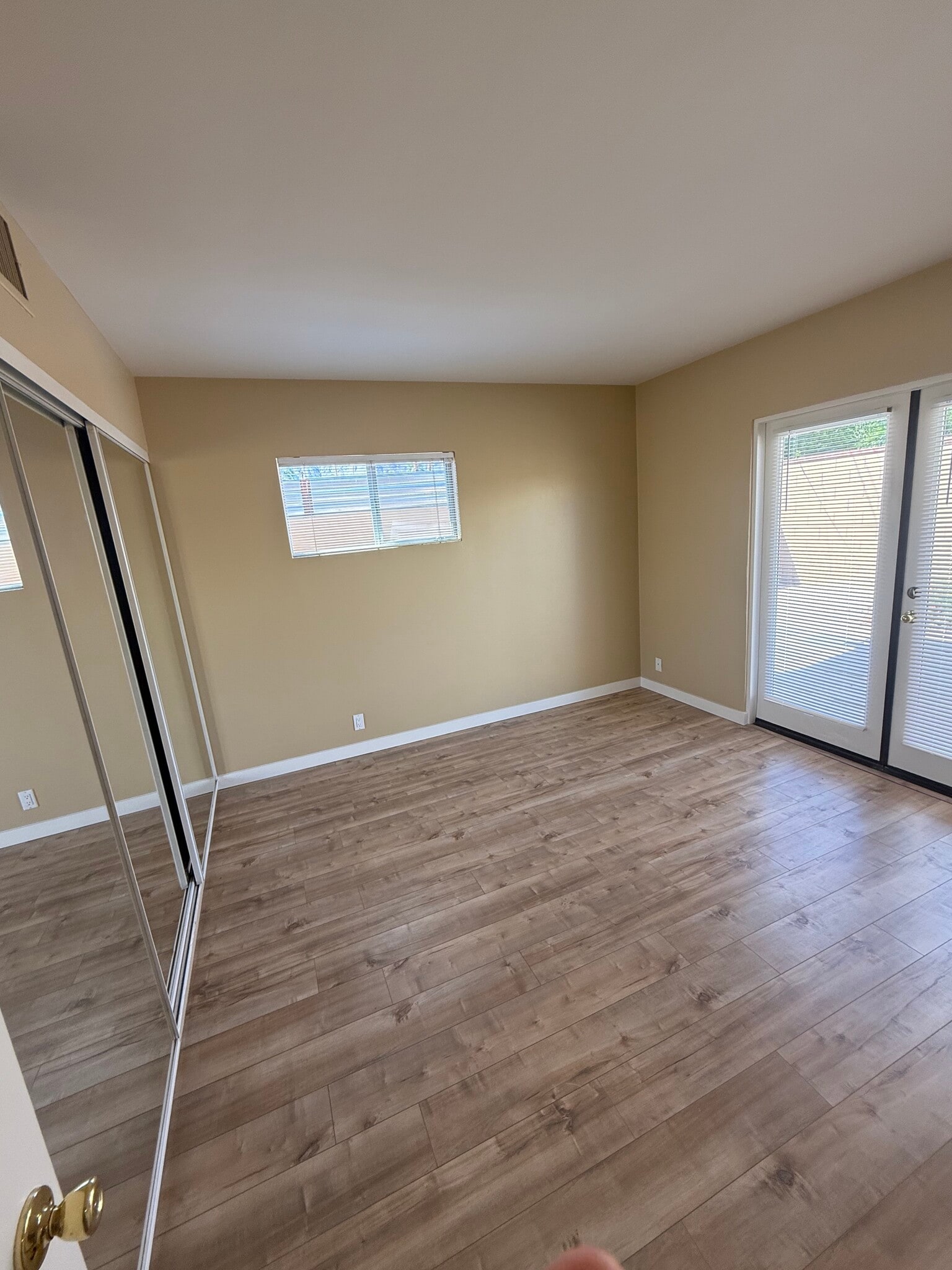 Second bedroom includes French door leading to private backyard. - 1450 E Granvia Valmonte