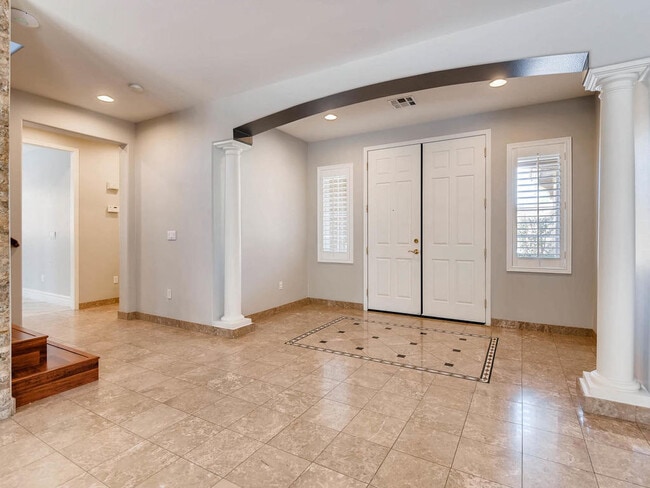 Building Photo - LUXURIOUS UPGRADED HOME IN A GATED SUMMERLIN AREA!!HOUSE HAS POOL AND SPA AND PATIO COVERED BACKY...