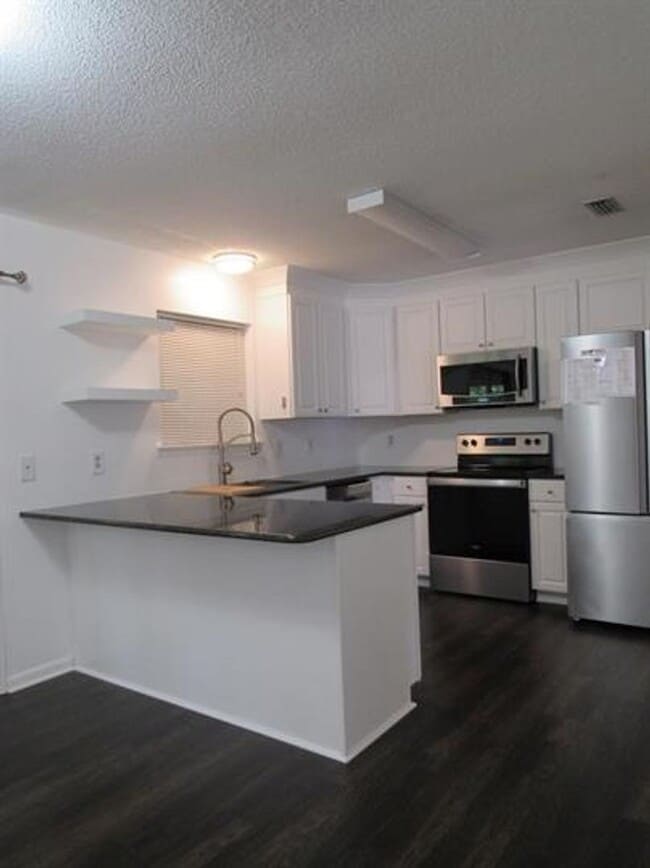 Building Photo - Available July!