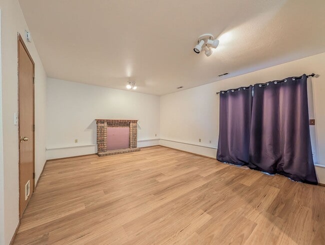 Building Photo - Tri-Level Home w/ Bonus Room, 2-Car Garage & Fenced Yard!