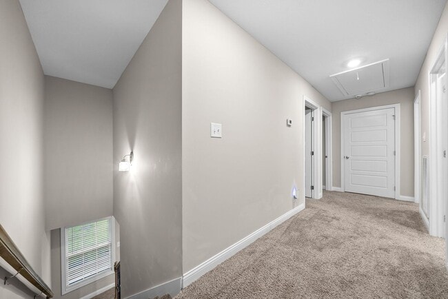 Building Photo - Stocked Pond, Walking Trails and More!!