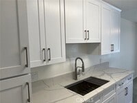 Building Photo - 7039 Remmet Ave