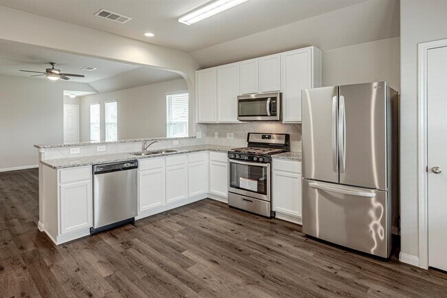 Building Photo - 4922 Blue Jacaranda Wy