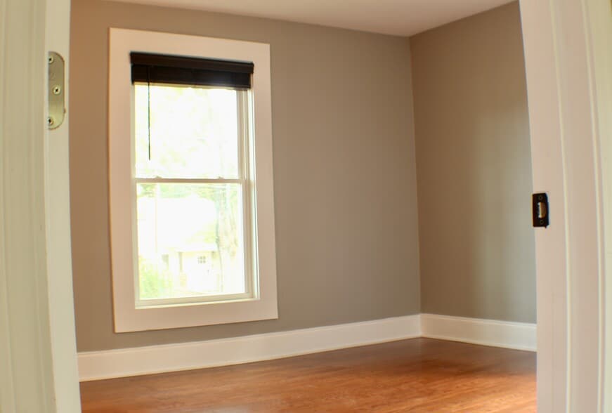 Entrance into the bedroom with vinyl plank floring - 311 Paris Mountain Ave