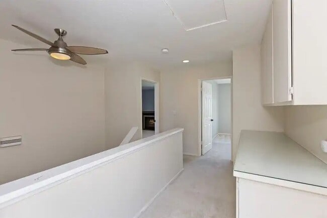 Building Photo - Upgraded La Costa Townhome