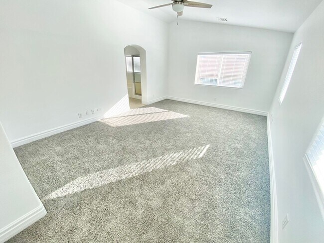 Building Photo - STUNNING 2 STORY HOME IN A GUARD GATED COM...