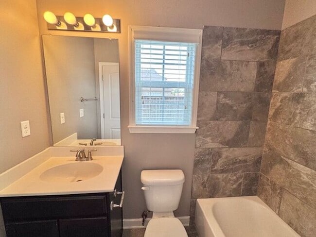 Building Photo - Olive Branch-Brand New 4 Bedroom 3 Bath Ho...