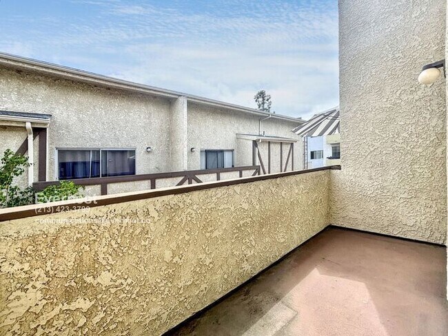 Building Photo - Lovely 2-Bed, 2-Bath Condo with Great Loca...