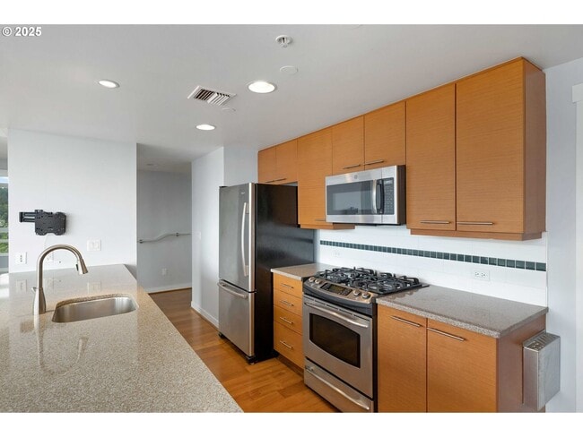 Building Photo - Modern 2-Bed/2-Bath Condo with Balcony & Prime Downtown Location