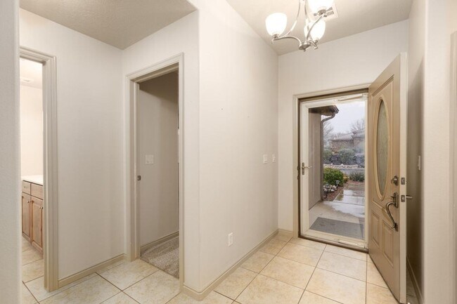 Building Photo - Single family with views and covered patio.