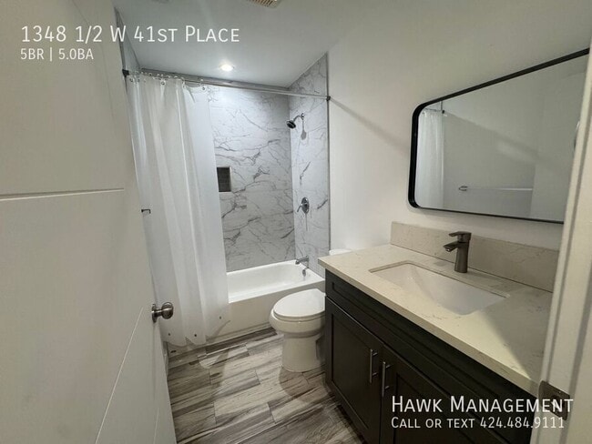 Building Photo - 1348 1/2 W 41st Place-