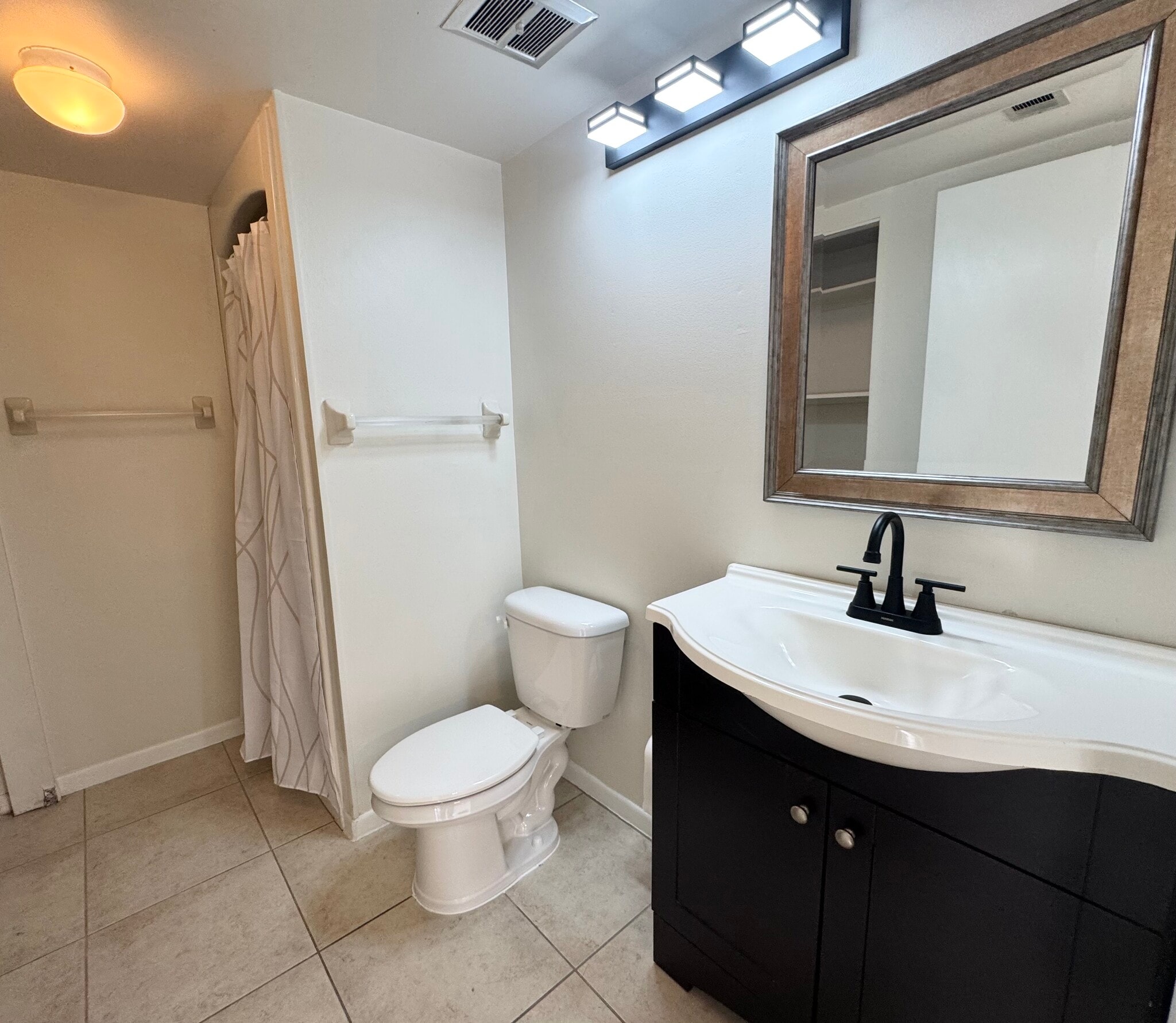 Main Floor Full Bathroom - 200 S Banana River Blvd