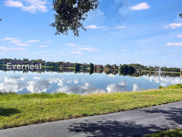 Building Photo - 9114 Lake Chase Island Way