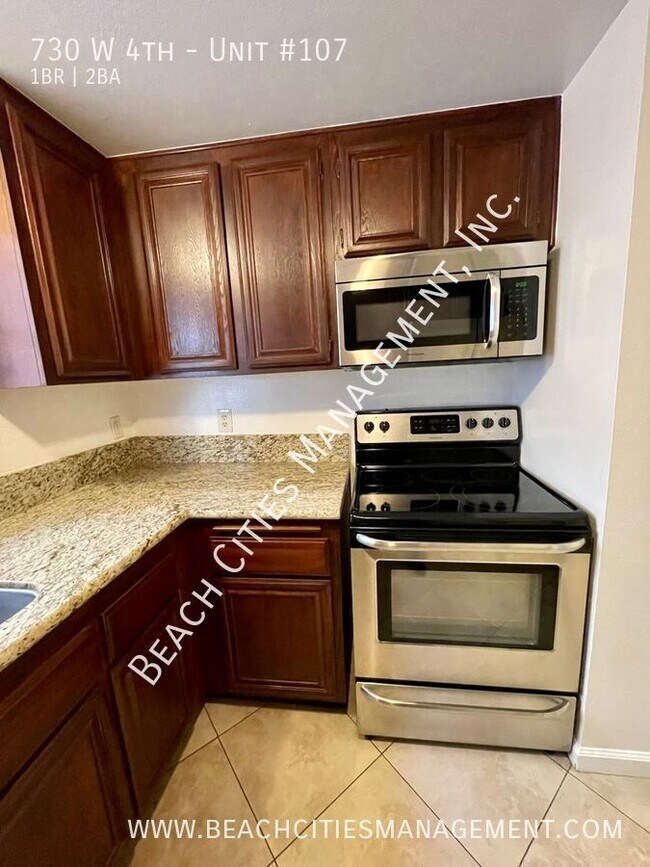 Building Photo - 730 W 4th-Unit #107