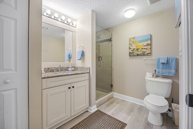 Building Photo - Available for a 7-12 month lease, Unit 208 has a beautiful oceanfront setting.