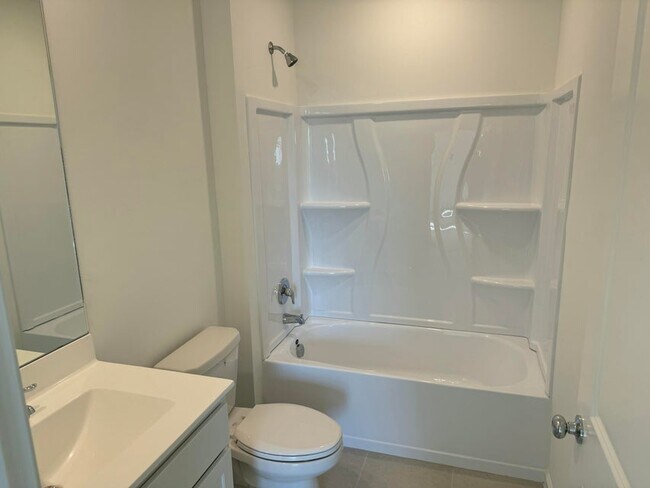 Building Photo - 5892 NW Sweetwood Dr