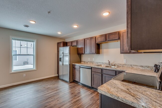 Building Photo - END UNIT townhome available July 01 $1825.00