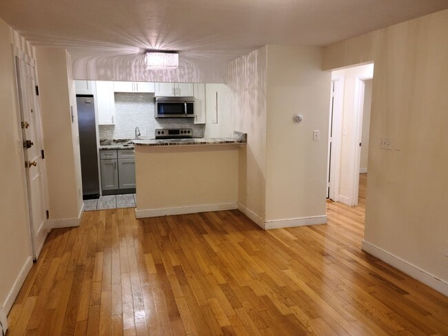 Building Photo - Off Street Parking - Short distance to T stop and Whole Foods - Updated kitchen and bathroom