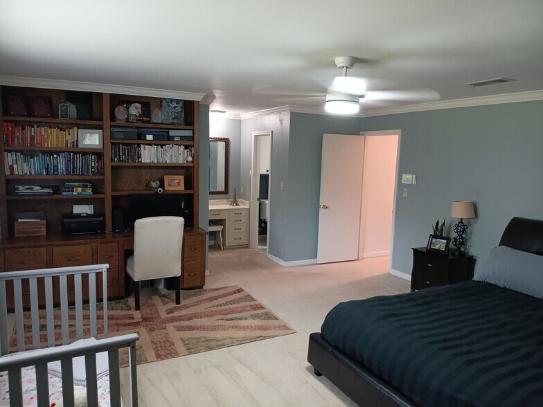 Primary Bedroom large built-in desk/shelf unit - 2308 Wesley Cir