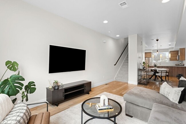 Building Photo - Modern 2-Bedroom Rowhome with Rooftop Moun...