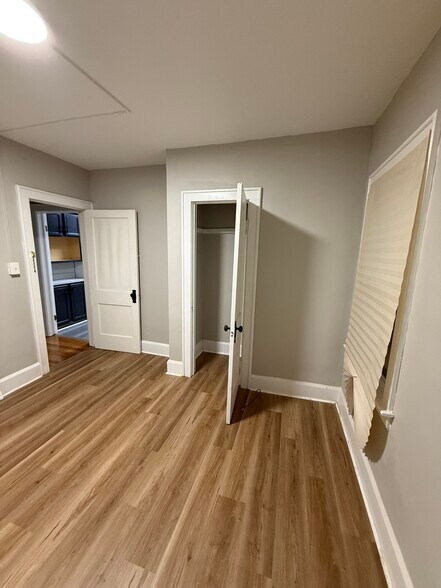 2nd room with vinyl flooring and closet - 3616 E 106th St