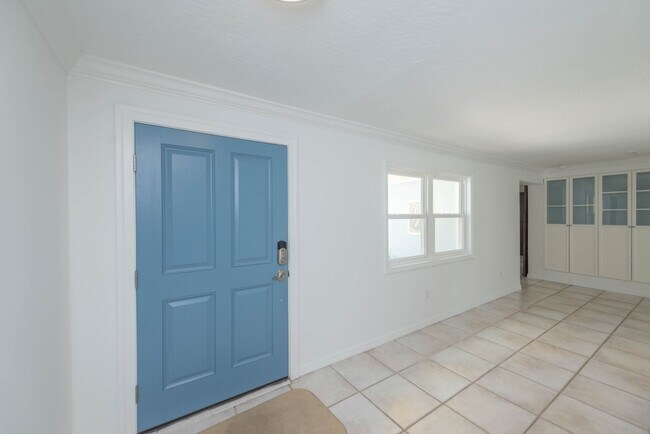 Building Photo - Live the ultimate Space Coast waterfront lifestyle at this stunning beachside canal home in Satel...