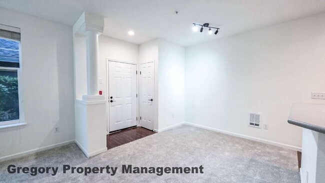 Building Photo - Sunlit & Spacious Ground-Level Condo | 12-Foot Ceilings, Luxury Amenities & Ideal Locale