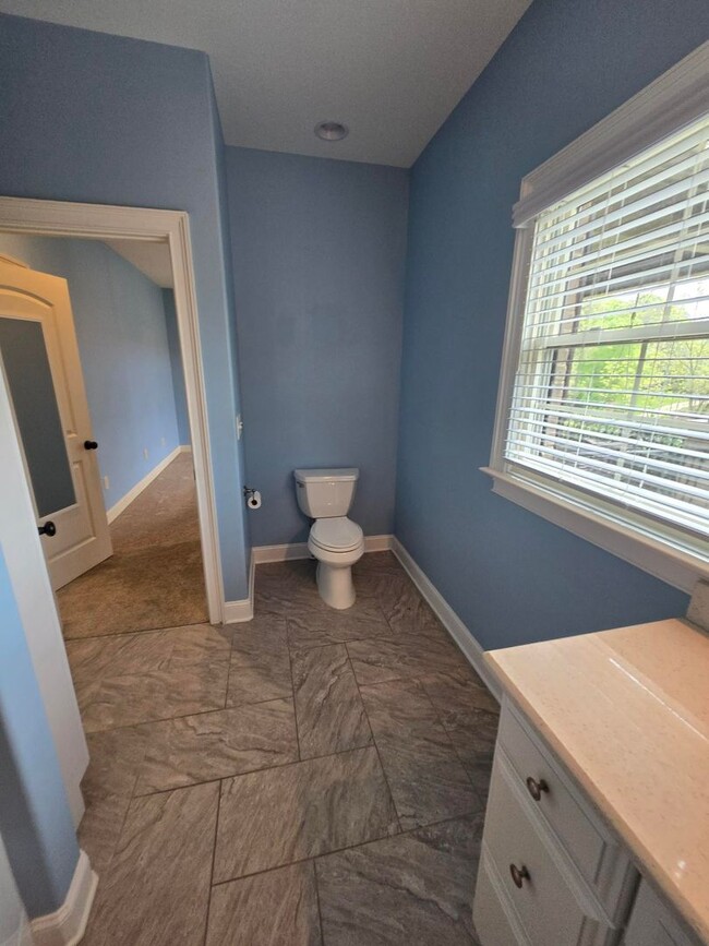 Building Photo - Luxury 4-Bedroom Home with Outdoor Oasis i...