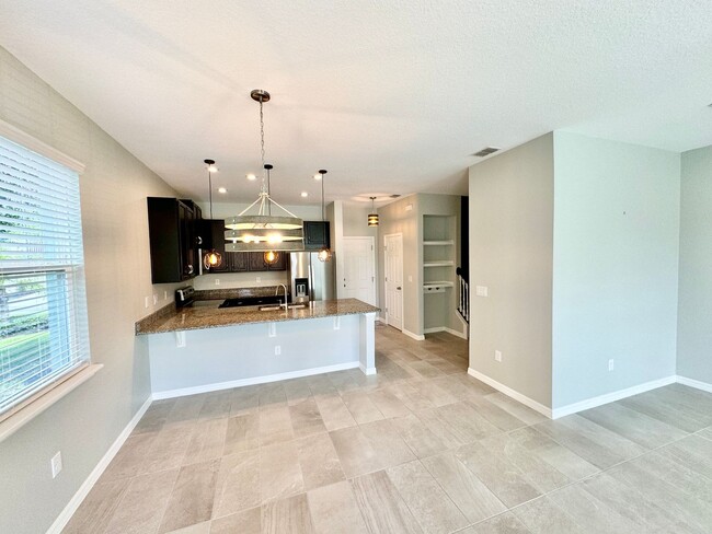 Building Photo - FOR RENT - Fantastic end unit townhouse in...