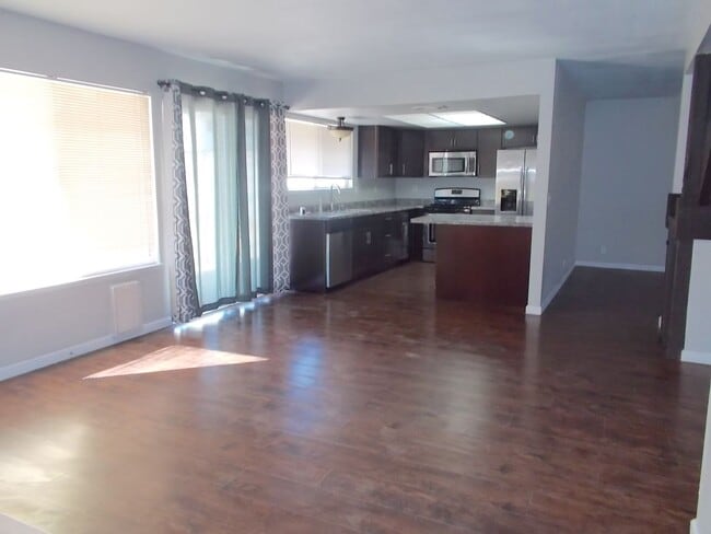 Building Photo - Spacious 4-Bedroom, 3-Bathroom Home with Open Floor Plan & Large Backyard – Prime Location!