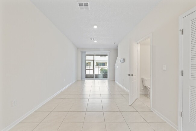 Building Photo - Oakleaf Plantation 3-Bedroom Townhouse in Towering Oaks – Spacious 1450 Sq Ft Living with 2 Full ...