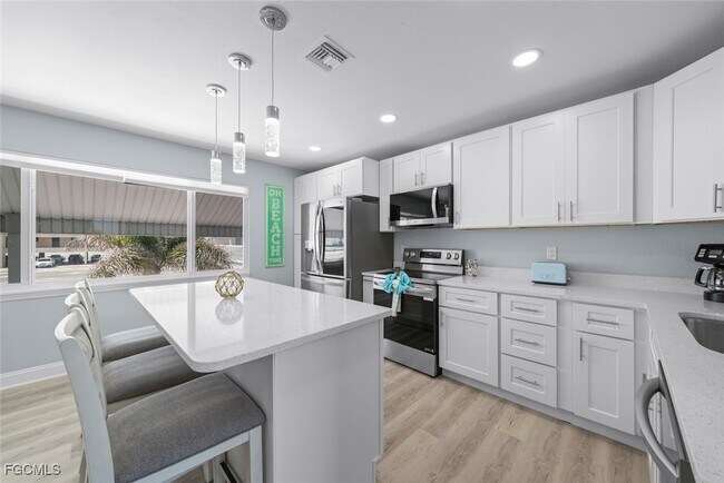 Building Photo - 6151 Estero Blvd