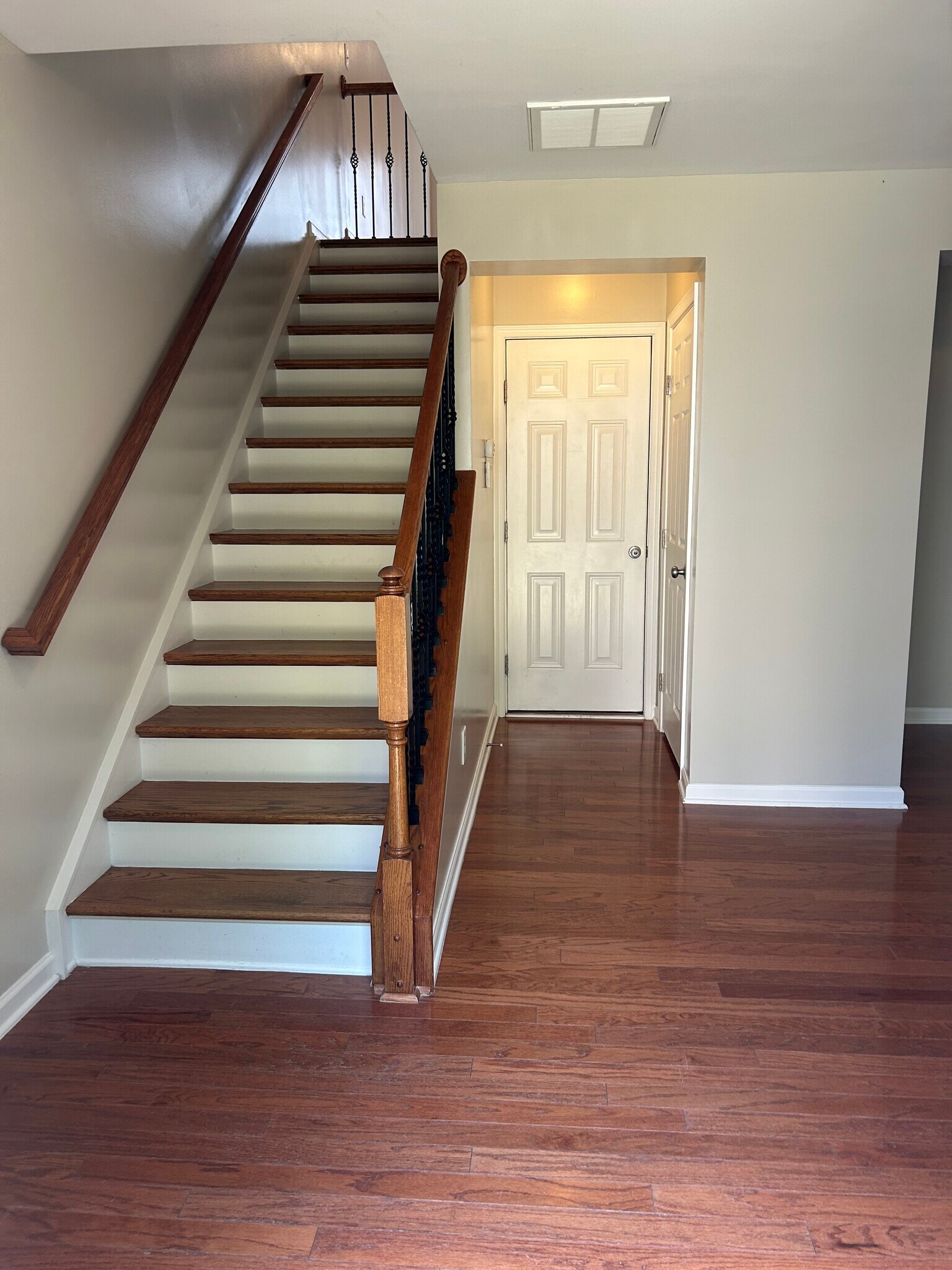 Stairs from lower to main floor - 237 N Irwin Ave