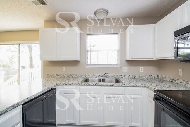 Building Photo - Enjoy living the good life in this 4 bedro...