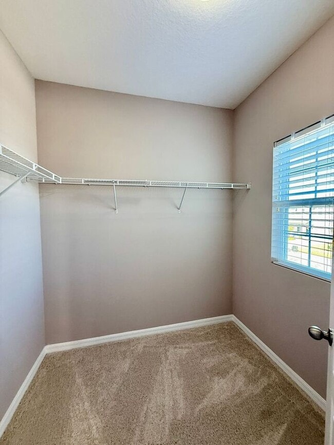 Building Photo - SPACIOUS Two Story Beautiful 5/4 Home in The Enclave At Aloma!