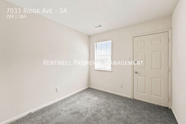 Building Photo - 7033 Ridge Ave