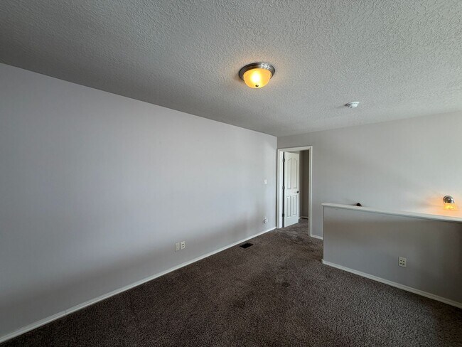 Building Photo - 7420 Tangerine Ct NE