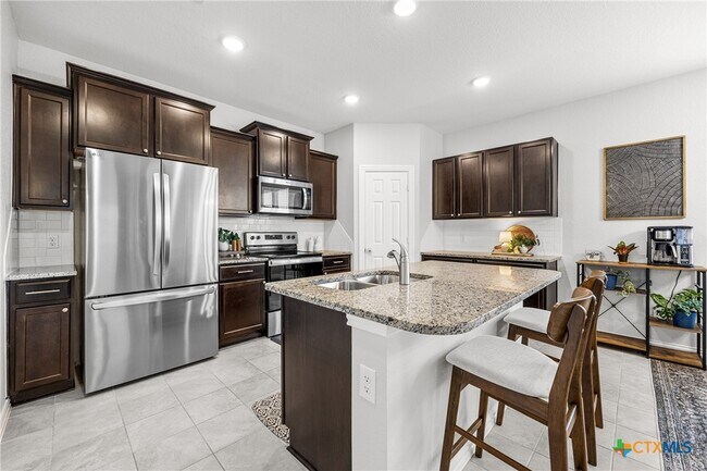 Building Photo - 8706 Hidden Oaks Dr