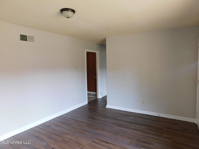 Building Photo - 7858 Cherry Valley Blvd