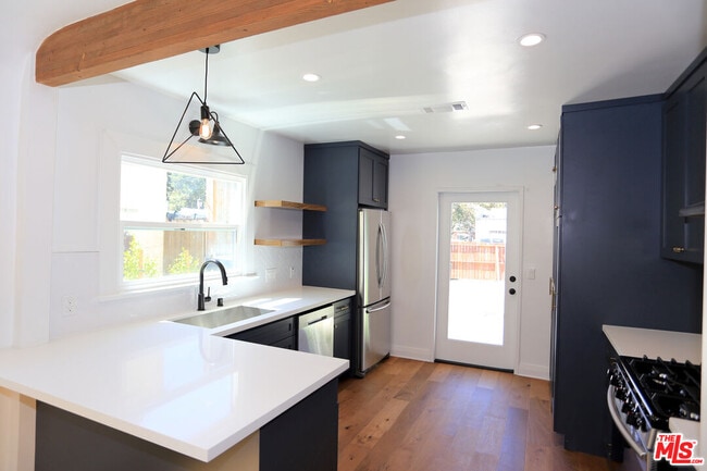 Building Photo - 3835 Hollypark Pl