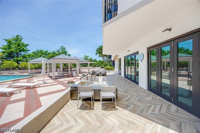 Building Photo - 6075 Pelican Bay Blvd