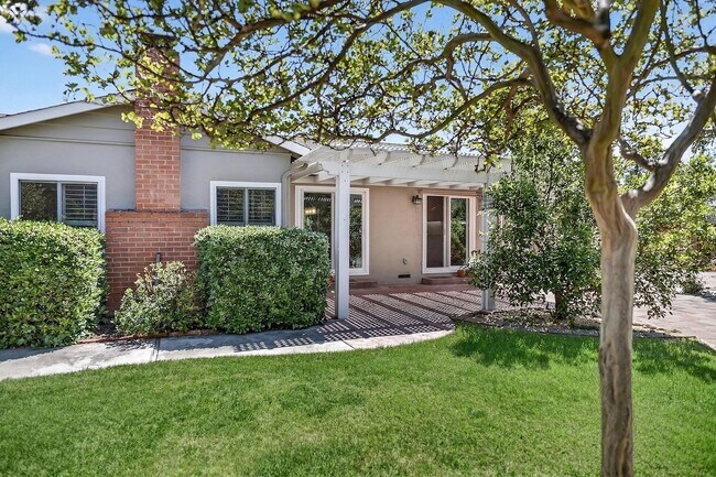 Building Photo - 2,003 Sq Ft Modern 4BR/2BA: Solar, EV Charging & Private Orchard!