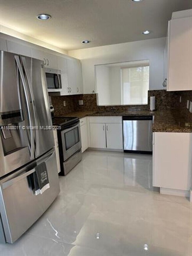 Building Photo - 6444 NW 109th Ave