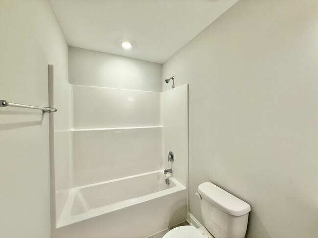 Building Photo - Stunning End Unit New Construction 3BD, 3....