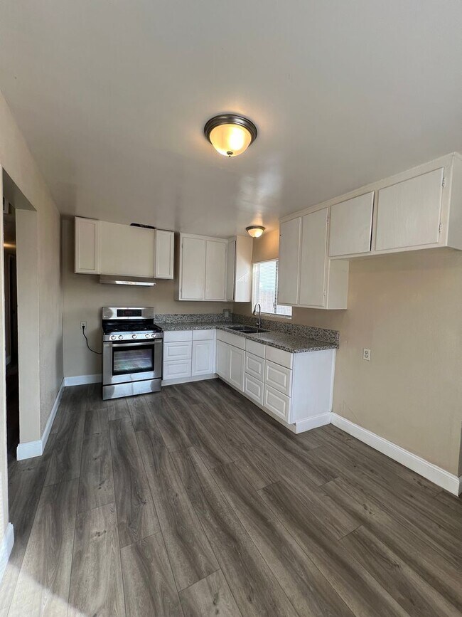 Building Photo - This cute home won't last long with a new ...