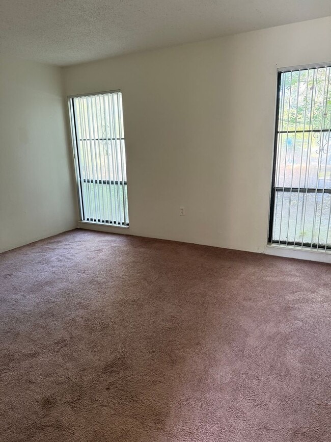 Building Photo - LEASE NOW AND ENJOY 50% OFF 2ND MONTH! Spa...